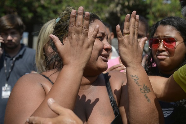 Rio: emocionada, viúva diz que queria ter morrido ao lado do marido